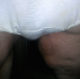 One of our users records his large wife taking a shit in her white panties. The bulge grows so big that poop pours out of the sides and onto the floor. Her panties are pulled down to show off the mess left on her ass and the clump of shit in her panties. 